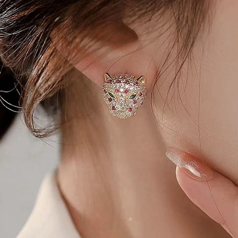 Unique and delicate leopard head earrings