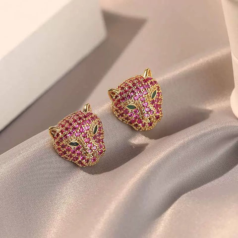 Unique and delicate leopard head earrings